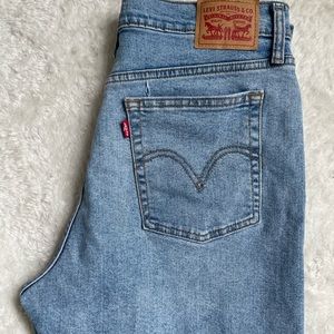 Levi’s highrise button fly straight wedgie denim.